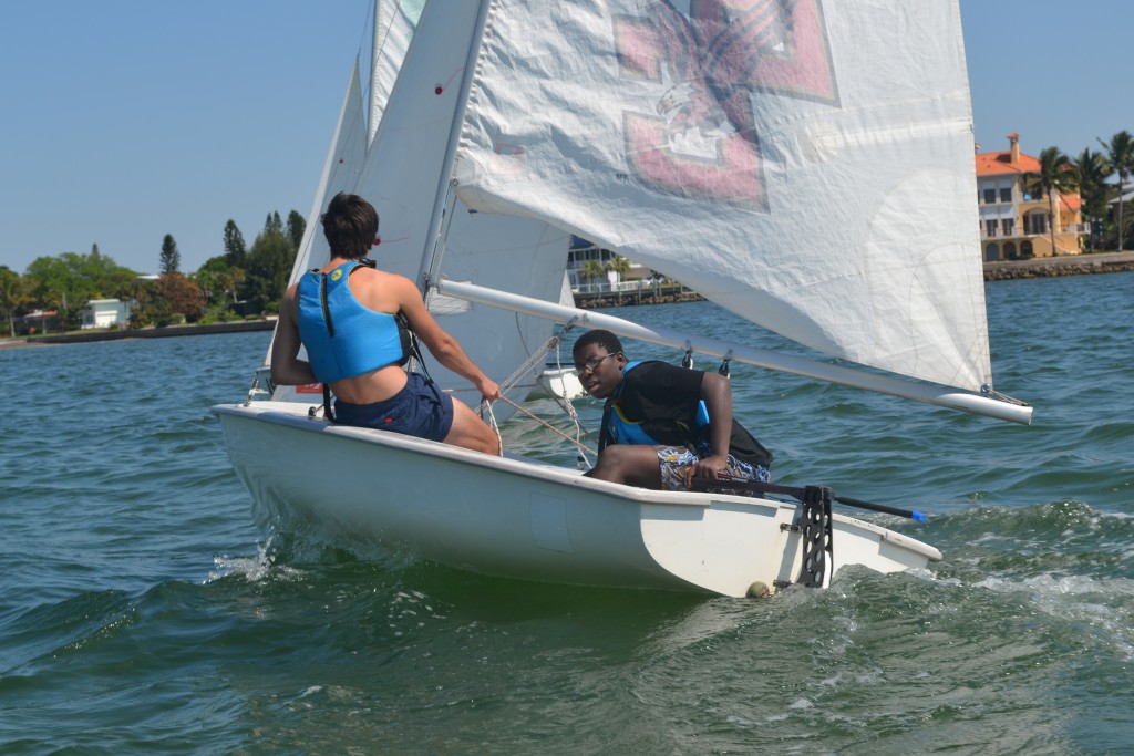 A Booker High School student and a New College mentor sail a boat in Sarasota Bay.