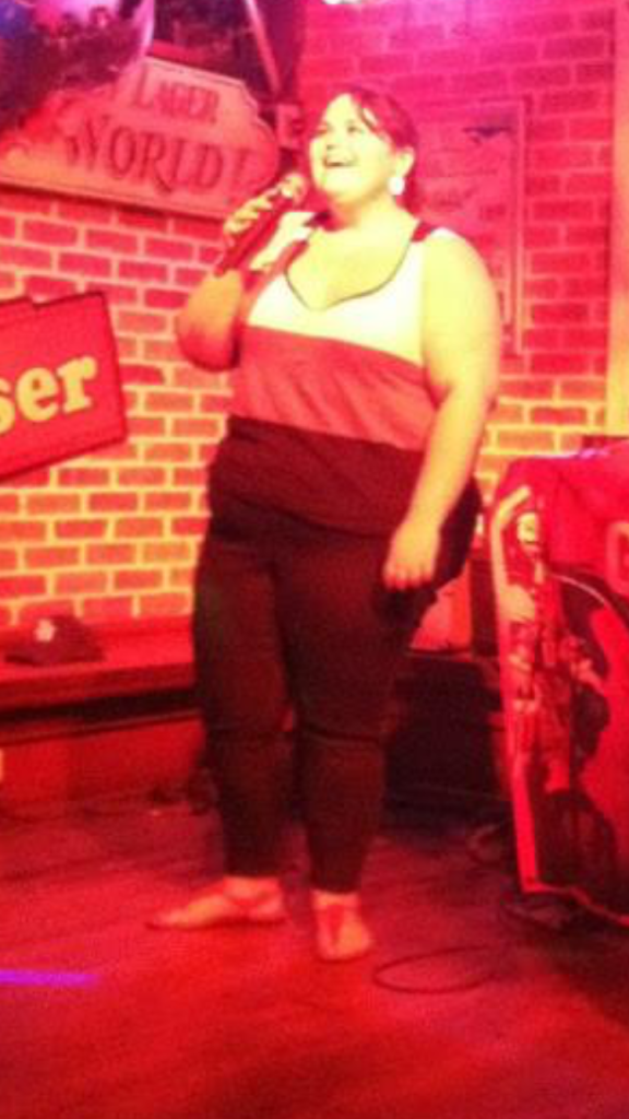 Elizabeth singing karaoke in Ybor City a few days before she decided to make a change.