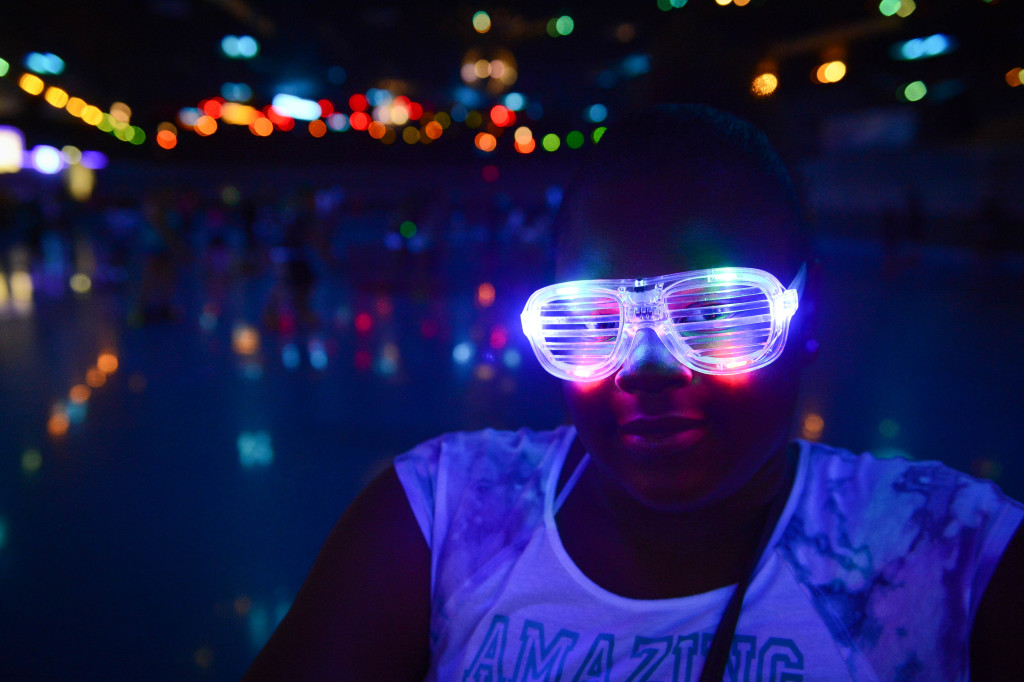 Ka'nesha Johnson, 10, wore blinking glasses for "Glow Skate" at Stardust Skate Center.  Photo by Rachel S. O'Hara