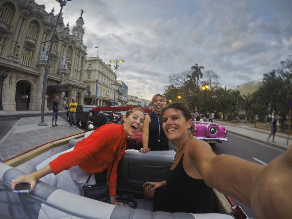 Admiral Travel's Alexis Leeming, left, and Taryn Daley Miller take a selfie as they ride through the streets of Havana in their Classic Convertible during a trip in April, 2016. PHOTO BY TARYN DALEY